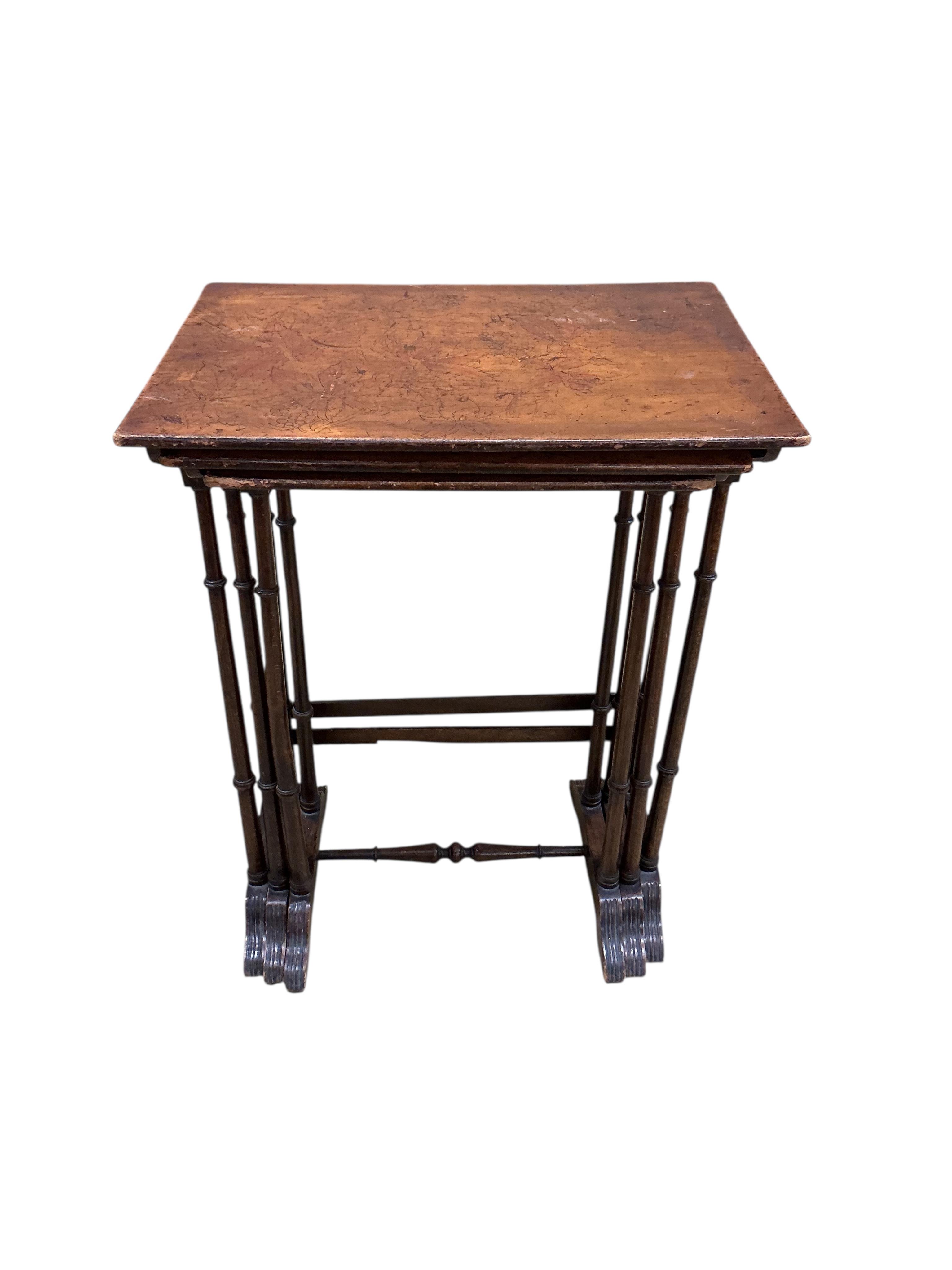 A nest of three beech occasional tables, width 56cm, depth 40cm, height 72cm